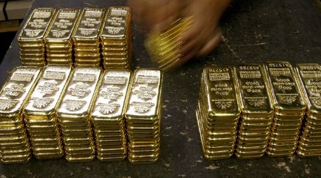 El oro se ubicó en mil 717.690 dólares por onza. ARCHIVO  /
