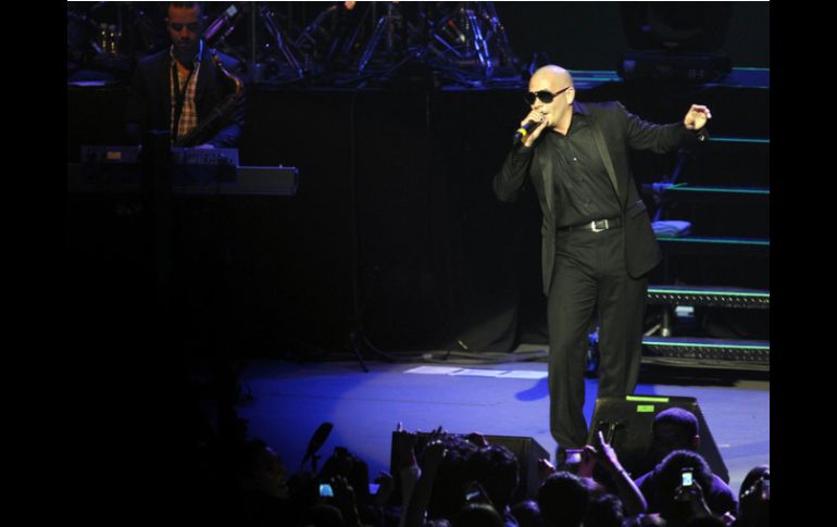 Pitbull encabeza el conteo de la semana del 24 al 30 de diciembre. ARCHIVO  /