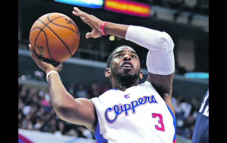 Chris Paul probó la agencia libre sólo unos minutos, antes de aceptar la oferta de su equipo y firmar una renovación. AP /