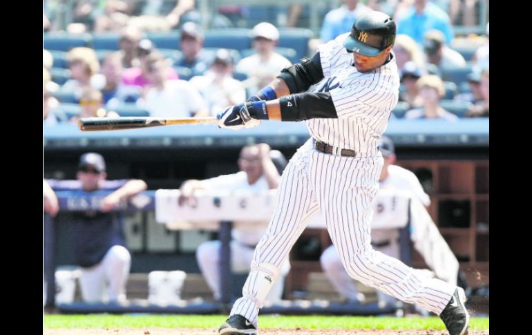 Robinson Canó conectó un imparable en cada uno de sus cuatro turnos al bat en el primer partido de la doble cartelera contra Toronto. AFP /