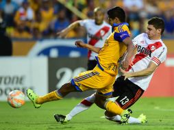 Ayala (i) salió de cambio en la ida que terminó 0-0. AFP / R. Schemidt