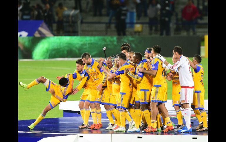 Los jugadores de Tigres celebran su victoria tras un partido de infarto. AFP / A. Estrella