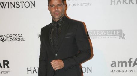 El más esperado fue el cantante Ricky Martin quien pasó tímidamente frente a las cámaras. EFE / S. Moreira