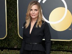 Pfeiffer portó un vestido color negro a manera de protesta contra el acoso sexual. AFP / F. M. Brown