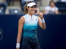 Garbiñe Muguruza celebra tras vencer a Kristina Mladenovic. EFE/M. Sierra
