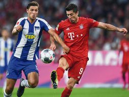 El delantero polaco, Robert Lewandowski (derecha), marcó los dos tantos del actual campeón de la Bundesliga. AFP