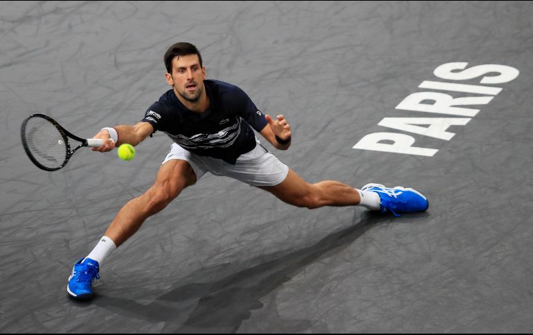 El serbio demostró calidad en los momentos clave del partido, mayor experiencia que su rival, que le tuvo contra las cuerdas en el juego de desempate del primer set. AFP / M. Euler