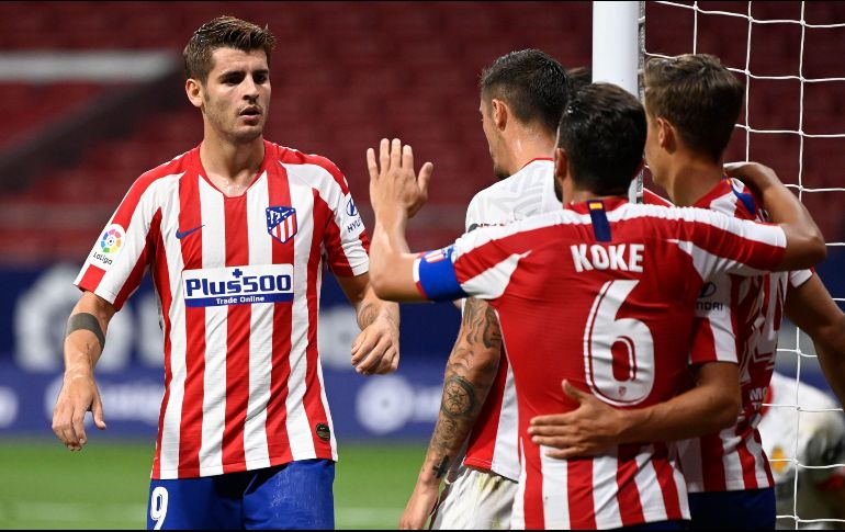 Atlético se mantiene en camino a la próxima Champions League. AFP / P. Marcou