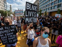 La marcha fue nombrada “Quita tu rodilla de nuestros cuellos”, en alusión a los recientes hechos racistas que han golpeado a la comunidad afroamericana. AP/M. Balce