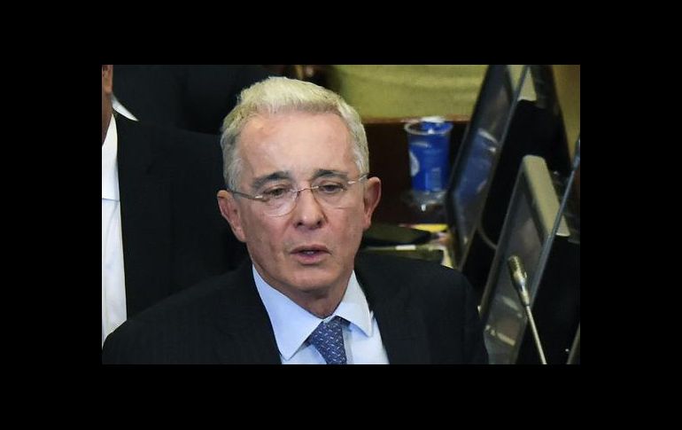 Uribe está señalado de promover grupos clandestinos que combatieron a las guerrillas y que están implicados en masacres. AFP/Archivo