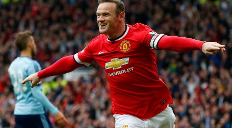 REFERENTE. Wayne Rooney ganó todos los títulos posibles como jugador del Manchester United y es considerado una leyenda de los Red Devils. AFP/ARCHIVO