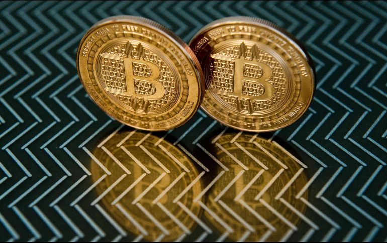 El bitcoin subió hoy un 6.9% a 61 mil 809.05 dólares. AFP/ARCHIVO