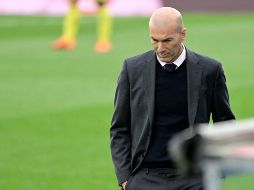 El técnico del Real Madrid, Zinedine Zidane, volvió a esquivar las preguntas sobre su continuidad. AFP / J. Soriano