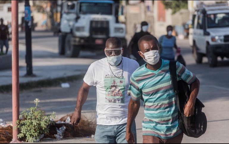 Los haitianos aún no reciben dosis de ninguna vacuna. AFP/P. Jean