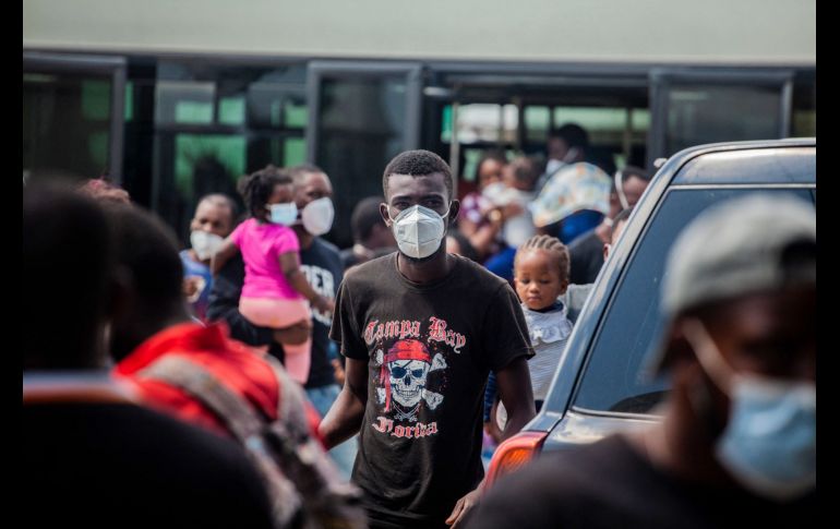 Migrantes expulsados de Estados Unidos arribaron el domingo a Puerto Príncipe. AFP/R. Pierrin