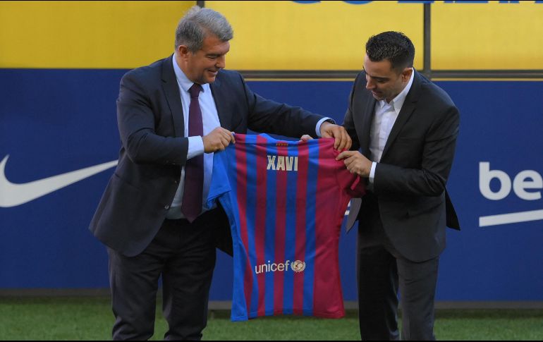Xavi fue anunciado como nuevo técnico del Barça después de tres días de negociaciones con el Al Sadd de Qatar. AFP / L. Gene
