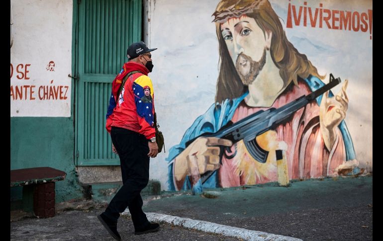 Hugo Chávez es venerado como una deidad en La Piedrita. AFP/Y. Cortez