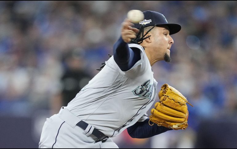 Luis Castillo se convirtió en el primer pitcher de Seattle en playoffs en tirar más de siete episodios. AFP/M. Blinch