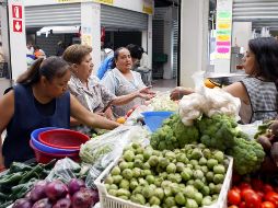 Locatarios del mercado de Mexicaltzingo vieron bajar sus ventas por la ampliación del Paseo Alcalde. EL INFORMADOR/Archivo