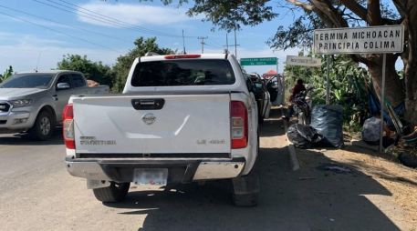 La camioneta donde viajaban los activistas fue hallada baleada sobre la carretera a Manzanillo. SUN