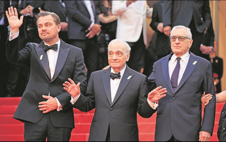 Leonardo DiCaprio, Martin Scorsese y Robert De Niro saludan desde la alfombra roja de Cannes. AFP/V. Hache