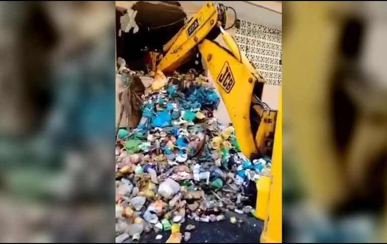 Vista de las toneladas de basura que autoridades municipales debieron sacar del departamento antes de clausurarlo. ESPECIAL