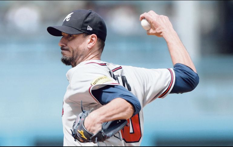 Charlie Morton, uno de los ases de la rotación de los Bravos, estaría reapareciendo en una eventual Serie de Campeonato. AFP/H. How