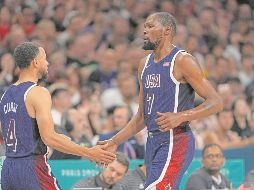 Estados Unidos espera grandes actuaciones de Stephen Curry y Kevin Durant para amarrar el pase a los cuartos de final. AFP/J. Garrabrant