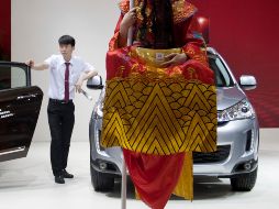 La rápida popularidad de las marcas chinas a forzado cambios en toda la cadena de la industria. AP/Archivo