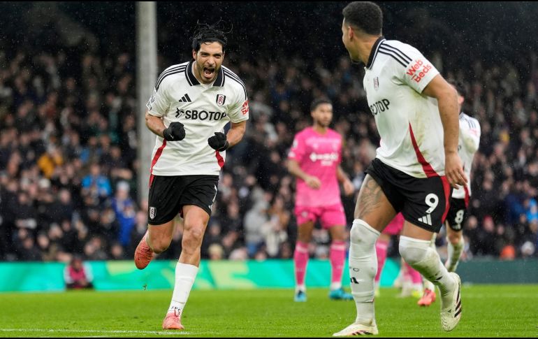 El mexicano Raúl Jiménez disparó al ángulo superior para llegar a un total de 55 tantos en Inglaterra y sentenciar la repartición de puntos. AP / A. Matthews