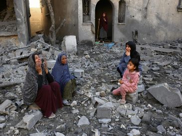 Palestinos sufren en la Franja de Gaza mientras Hamás e Israel negocian de la mano de Estados Unidos un alto al fuego. AFP/B. Taleb
