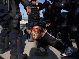 Mientras tanto, las protestas que se llevan a cabo en Los Ángeles en contra de las redadas de inmigración también se han propagado a Atlanta y la última de ellas terminó con varias detenciones. EFE/ A. DINNER