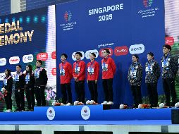 México (L) finalizó con 426.30 unidades, repitiendo la medalla de plata, detrás de China (C), mientras que Japón (D) completó el podio con una puntuación de 409.65. AFP / ARCHIVO