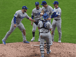 Jugadores de los Dodgers, en el primero juego de la serie ante los Brewers. EFE / R. Harried