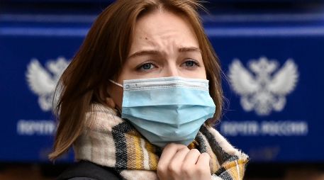 El nuevo virus de la influenza ha traído de regreso la mascarillas en el Reino Unido. AFP/K. Kudryavtsev