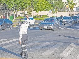 Policías viales supervisan el flujo vehicular en distintas avenidas de la Zona Metropolitana de Guadalajara para reducir congestionamientos y reforzar la seguridad. E INFORMADOR/A. Navarro