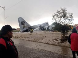La gente que estaba en el lugar reportó que quedaron esparcidos en el sitio billetes que eran transportados en el avión. EFE/ Noticias San Roque D7