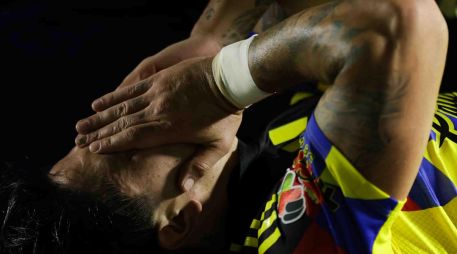 Además de la derrota que bajó al equipo al noveno puesto, el América perdió a Víctor Dávila por lesión. El chileno podría perderse lo que resta del torneo. SUN/C. Mejía