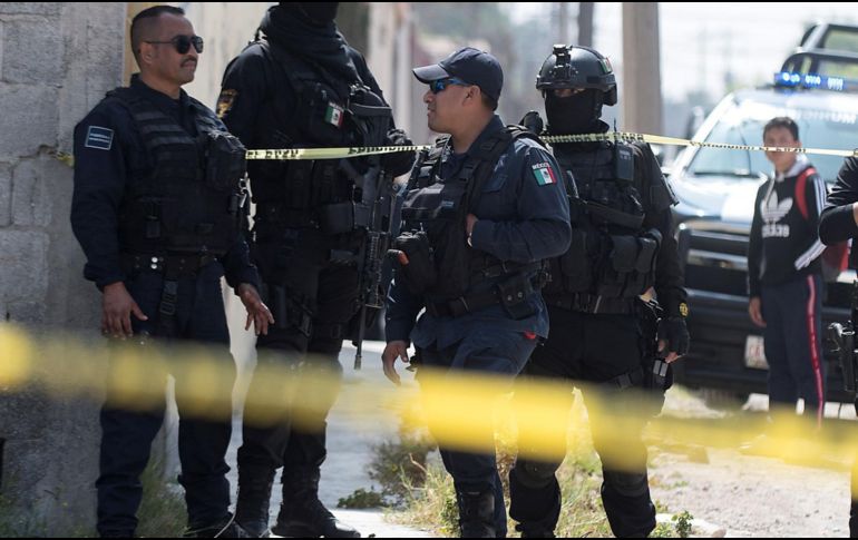 Tras el ataque, la patrulla donde los policías realizaban su recorrido quedó con decenas de impactos de arma de fuego. EFE/ARCHIVO