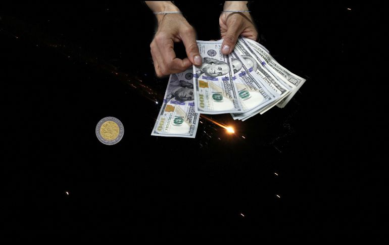 Esta es la cotización del tipo de cambio de dólar a pesos mexicanos para la mañana de este miércoles 25 de marzo. EFE / ALA BADARNEH