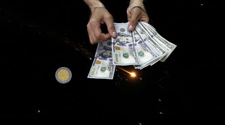 Esta es la cotización del tipo de cambio de dólar a pesos mexicanos para la mañana de este miércoles 25 de marzo. EFE / ALA BADARNEH