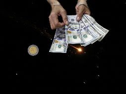 Esta es la cotización del tipo de cambio de dólar a pesos mexicanos para la mañana de este miércoles 25 de marzo. EFE / ALA BADARNEH