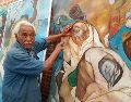 Melchor Peredo García mostrando uno de sus murales en Veracruz (Mexico).  EFE / ARCHIVO