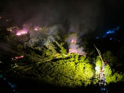 Vista aérea tomada con un dron el 4 de mayo de 2026 de la escena del rescate después de una explosión en una fábrica de fuegos artificiales, en el poblado de Guandu de Liuyang. XINHUA