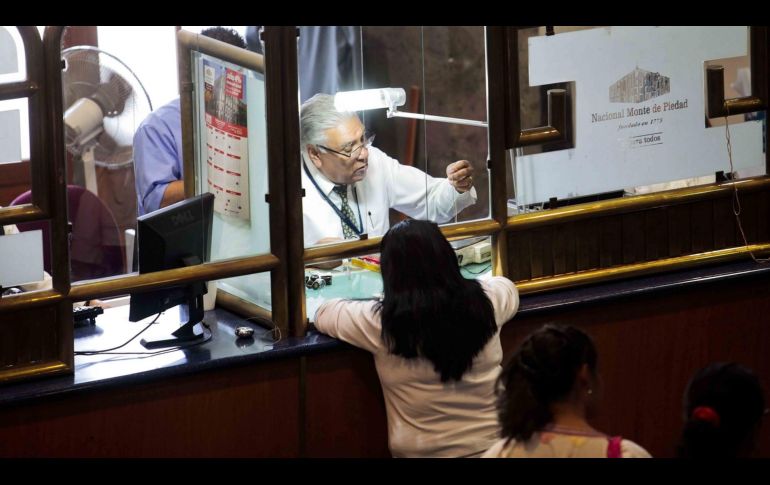 Miles de familias y trabajadores enfrentan incertidumbre económica ante la prolongación indefinida de la huelga en Nacional Monte de Piedad. SUN/ARCHIVO