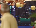 A pesar de que el Nasdaq y el S&P 500 retrocedieron hoy, el ambiente positivo reinó en los inversionistas. EFE/R. Khan