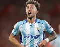 Los goles de Chupe y Larrubia encaminaron el ascenso malaguista pese al intento de reacción del Almería. EFE / J. Zapata.
