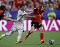 Un gol en el tiempo de compensación aseguró la clasificación de Austria y Argelia a la fase de eliminación directa. EFE.