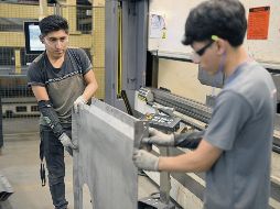 La revisión del T-MEC representa una ventana para fortalecer la posición de Norteamérica como la región económica más integrada y competitiva del mundo. AFP