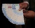 Conocer los límites permitidos para recibir dinero en físico te salvará de severas sanciones regulatorias. SUN/ARCHIVO